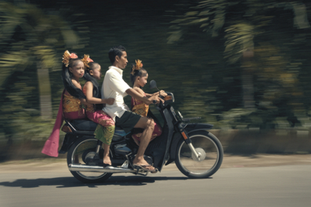 Balinese family on the way