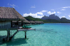 Exterior view of a luxury overwater bungalow