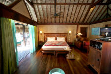 Overwater luxury bungalow bedroom