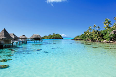 View of the overwater luxury bungalows from the lagoon