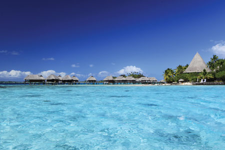 View of the overwater luxury bungalows from the lagoon