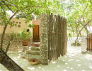 Taj Coral Reef Resort - Beach Bungalow entrance