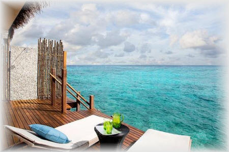 Taj Coral Reef Resort - Overwater bungalow