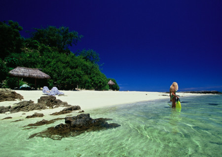 Snorkeller on the beach